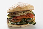 Toasted roll filled with grilled vegetables