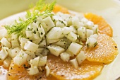 Fennel salad on orange slices (close-up)