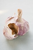 Garlic bulb with a clove separated