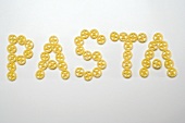The word 'Pasta' in wagon wheel pasta