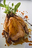 Roast chicken with fresh herbs (overhead view)