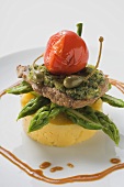 Escalope with herbs, capers, pepper & asparagus on polenta