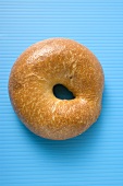 Bagel on blue background