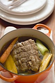 Boiled beef with soup vegetables in cocotte
