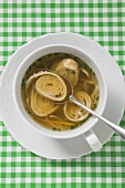 Pancake soup with vegetables and chives