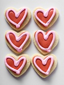 Heart-shaped biscuits with red icing