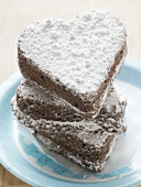 Chocolate hearts sprinkled with icing sugar