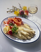 Asparagus with ham & hollandaise sauce, glass of white wine