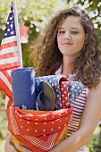 Young woman at a 4th of July garden party (USA)