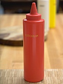 Ketchup in red plastic bottle