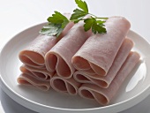 Ham rolls garnished with parsley