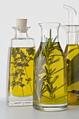Three different herb oils in bottles