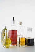 Various types of oil and vinegar in bottles