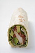 Wrap filled with chicken and avocado