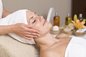Woman having beauty treatment (face massage)