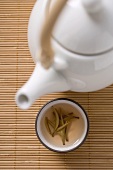 Teapot and bowl of spice tea