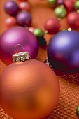 Coloured Christmas baubles of various sizes