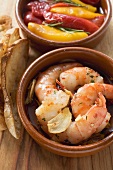 Garlic prawns, toasted bread and marinated peppers