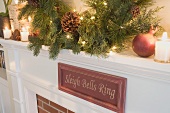 Mantelpiece decorated for Christmas (detail)