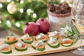 Cucumber slices with smoked salmon & dill cream (Christmas)