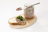 Liver sausage in jar and on bread