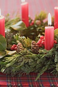 Advent wreath with four burning candles