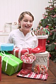 Girl with Christmas gifts