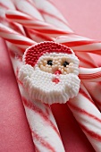 Father Christmas biscuits and candy canes (detail)