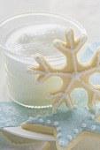 Christmas biscuits and glass of milk foam