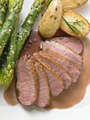 Duck breast with asparagus and rosemary potatoes (detail)