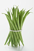 Several green beans, tied in a bundle