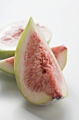 Fresh fig, cut into one half and two quarters