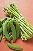 Green asparagus and pea pods