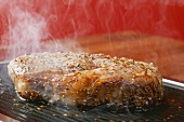 Grilling peppered steak