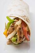 Wrap filled with chicken and peppers