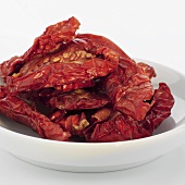 Organic dried tomatoes in white dish