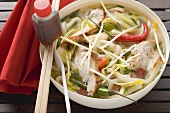 Spicy noodle soup with chicken, vegetables & soy sauce (Asia)