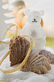 Bear's paw cookies on sugar, polar bear candle, Xmas decorations