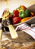 Mixed peppers in wooden bowl