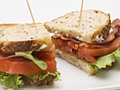 Bacon, lettuce and tomato sandwich, halved