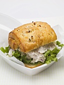 Chicken salad sandwich in polystyrene container