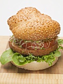 Burger with sprouts and tomato