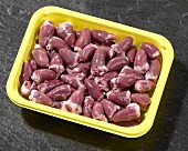 Chicken hearts in plastic container