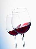 Red wine swirling in a glass