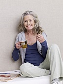 Mature woman with a glass of tea