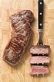 Rump steak cooked to different degrees (rare, medium, well done)