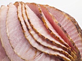 Roast ham, partly carved (close-up)