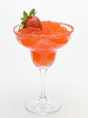 Frozen Strawberry Daiquiri in glass with fresh strawberry