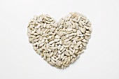 Sunflower seeds forming a heart