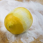 Peeled lemon on sugar